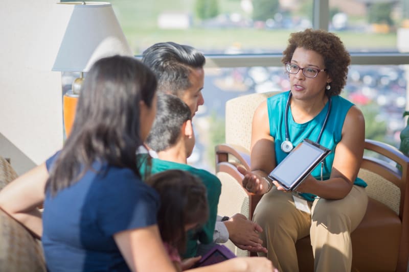 Doctor speaking to Family.