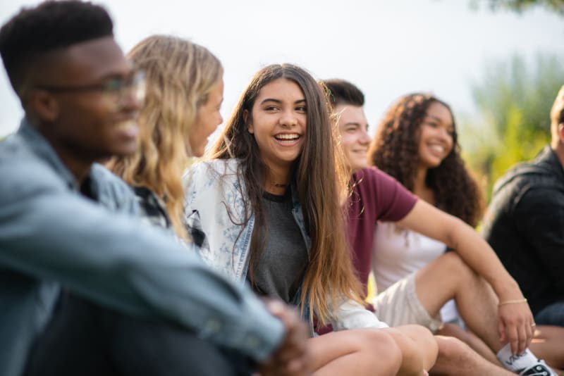 Teenagers being social outside